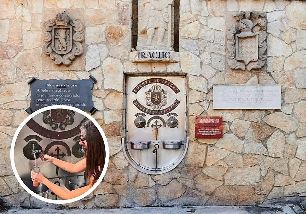 Fuente de vino gratuita en el Camino de Santiago. Una mujer llena una botella en la Fuente de Irache, un lugar emblemático para peregrinos.