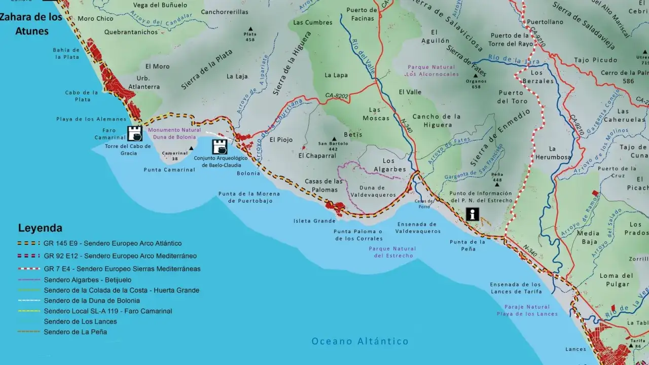 Mapa de senderos y puntos de interés en las playas de Tarifa, incluyendo monumentos, faros y parques naturales.